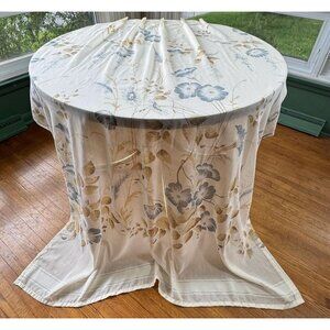 Vintage 1970s pleated curtains, large blue flowers, cream background, pair